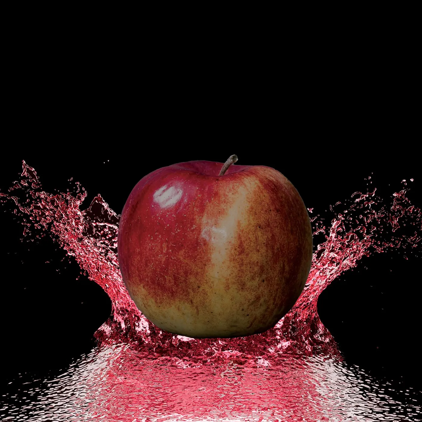 Apple Splash: Dropped into a red juice splash; Photoshop compositing lesson.